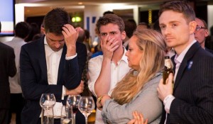 Supporters of the 'Stronger In' Campaign react as results of the EU referendum are announced at a results party at the Royal Festival Hall in London on June 23, 2016. Bookmakers dramatically reversed the odds on Britain leaving the European Union on Friday as early results from a historic referendum pointed to strong support for a Brexit. / AFP PHOTO / POOL / ROB STOTHARDROB STOTHARD/AFP/Getty Images